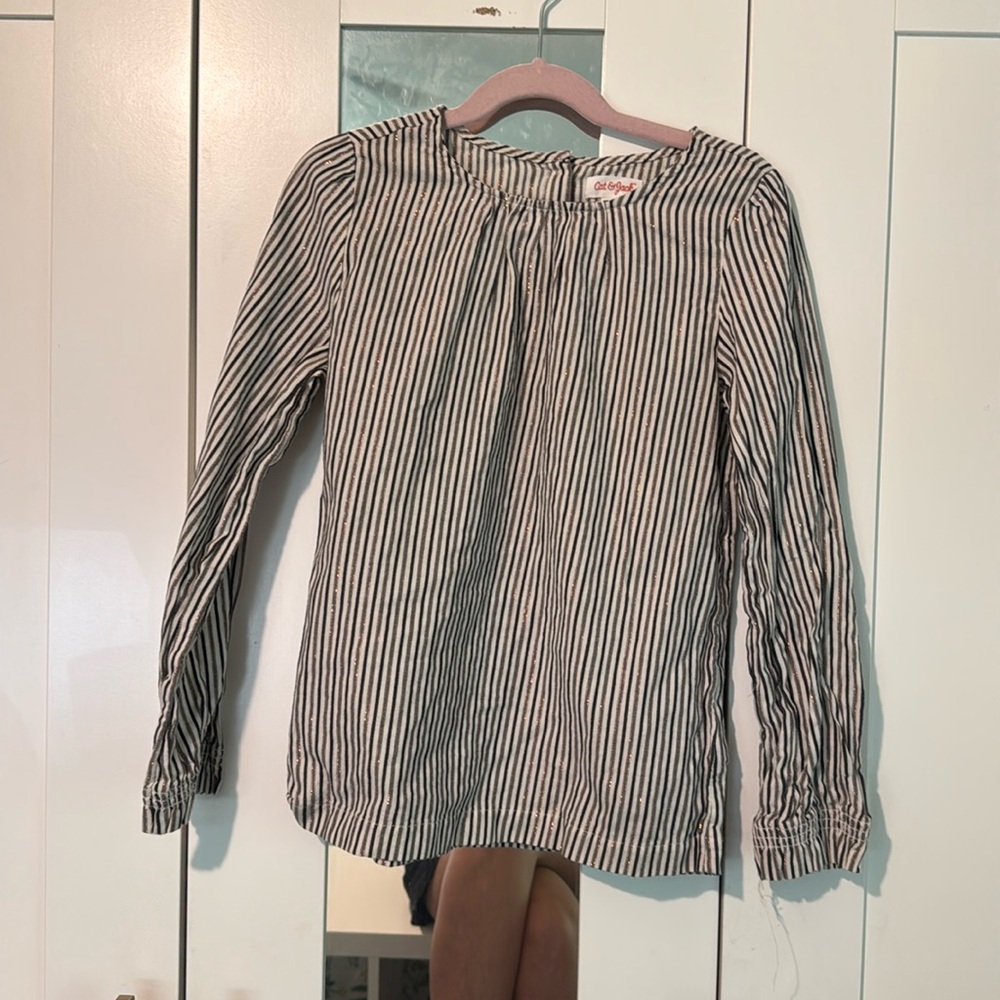 Cat and Jack top size 7/8. Gold cream, and black stripes.   Like new